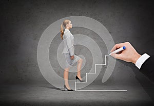 Businesswoman stepping up staircase