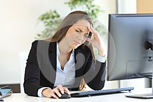 Businesswoman suffering headache