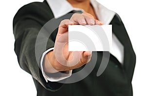 Businesswoman in suit holding empty business card