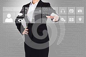 Businesswoman in suit pointing finger to app menu