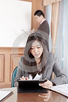 Businesswoman and tablet