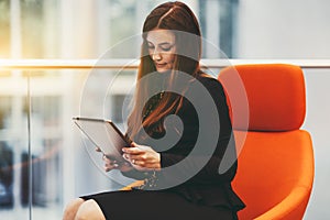 A businesswoman with a tablet pc