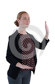 Businesswoman taking oath against white background