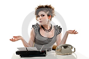 Businesswoman taking telephone call in office