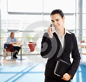 Businesswoman talkin on mobile phone