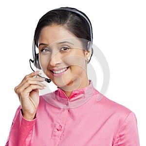 Businesswoman talking on headphones