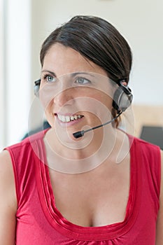 Businesswoman talking on headset