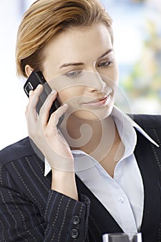 Businesswoman talking on mobilephone