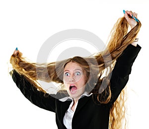 Businesswoman tearing her hair