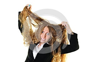 Businesswoman tearing her hair