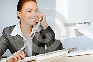 Businesswoman with telephone