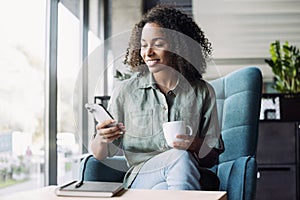 Businesswoman texting on mobile phone at office, Young student woman using smartphone at cafe, Online communication, business