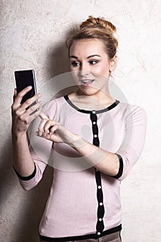 Businesswoman texting reading sms on smartphone