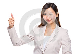 Businesswoman with thumb up