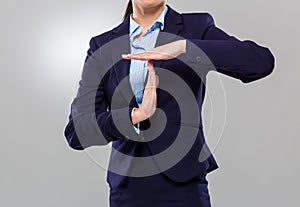 Businesswoman timeout gesture