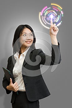 Businesswoman touch technology.