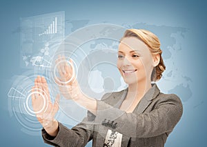 Businesswoman touching virtual screen