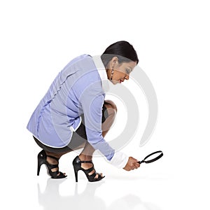 Businesswoman - tracking with magnifying glass