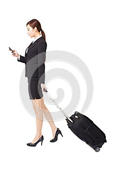 Businesswoman traveling with suitcase isolated