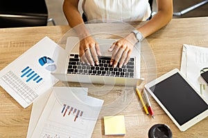 Businesswoman typing on laptop at workplace Woman working in home office hand keyboard