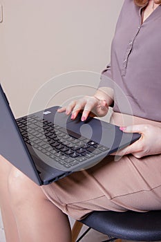 Businesswoman typing on laptop at workplace Woman working in home office hand keyboard