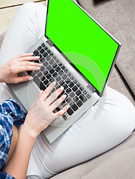 Businesswoman typing on laptop at workplace Woman working in home office hand keyboard.