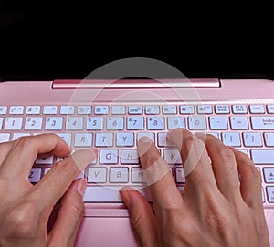 Businesswoman typing on laptop at workplace Woman working in home office hand keyboard.