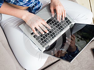 Businesswoman typing on laptop at workplace Woman working in home office hand keyboard. mock up