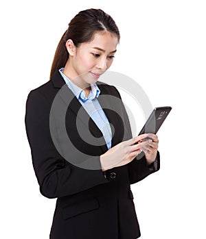 Businesswoman use of mobile phone