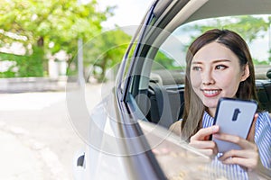 Businesswoman use phone in car