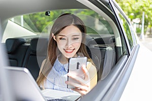 Businesswoman use phone in car