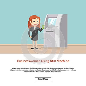 The businesswoman using ATM machine