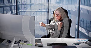 Businesswoman using computer to compute photo