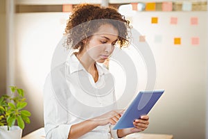 Businesswoman using digital tablet