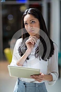 Businesswoman using digital tablet