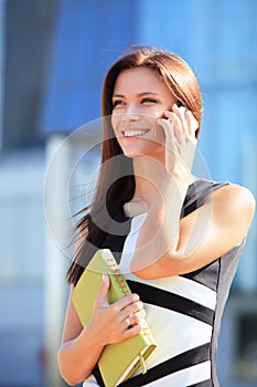 Businesswoman using mobile phone photo