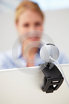 Businesswoman using Skype on Laptop photo