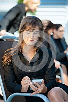 Businesswoman using smart phone photo