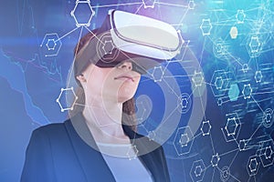 Businesswoman in VR glasses, graph and network