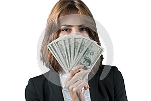 Businesswoman with wad of money in her hands