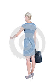 Businesswoman walking with a briefcase