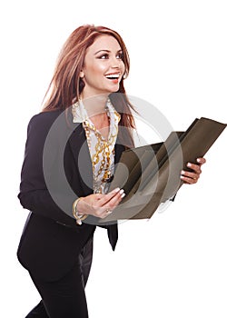 Businesswoman walking with files in her hands