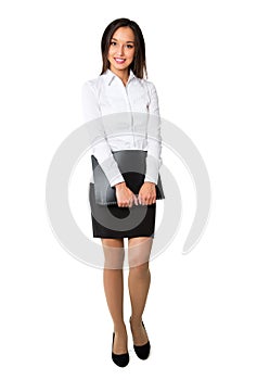 Businesswoman walking in full length on white background