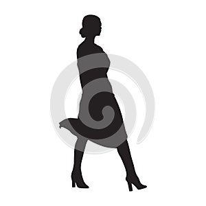 Businesswoman walking, side view, isolated vector silhouette. Business people, model