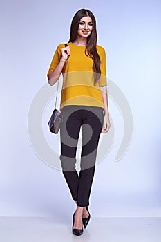 Businesswoman wear yellow silk jacket cotton trousers suit