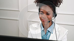 Businesswoman wearing headset working in crucial office