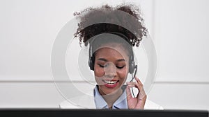 Businesswoman wearing headset working in crucial office