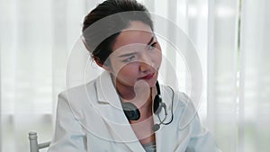 Businesswoman wearing headset working in vivancy office