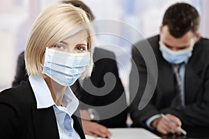 Businesswoman wearing mask photo