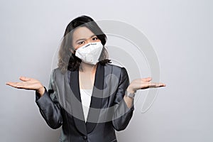 Businesswoman wearing the N95 mask